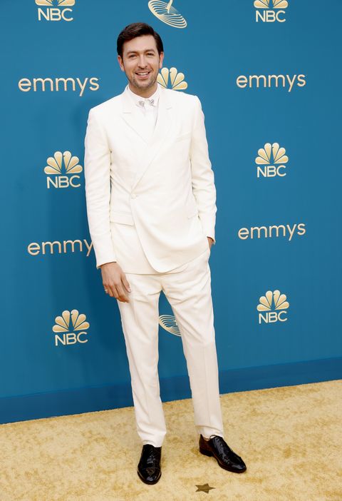 nicholas braun wearing a white dior tuxedo at the 2022 emmy awards
