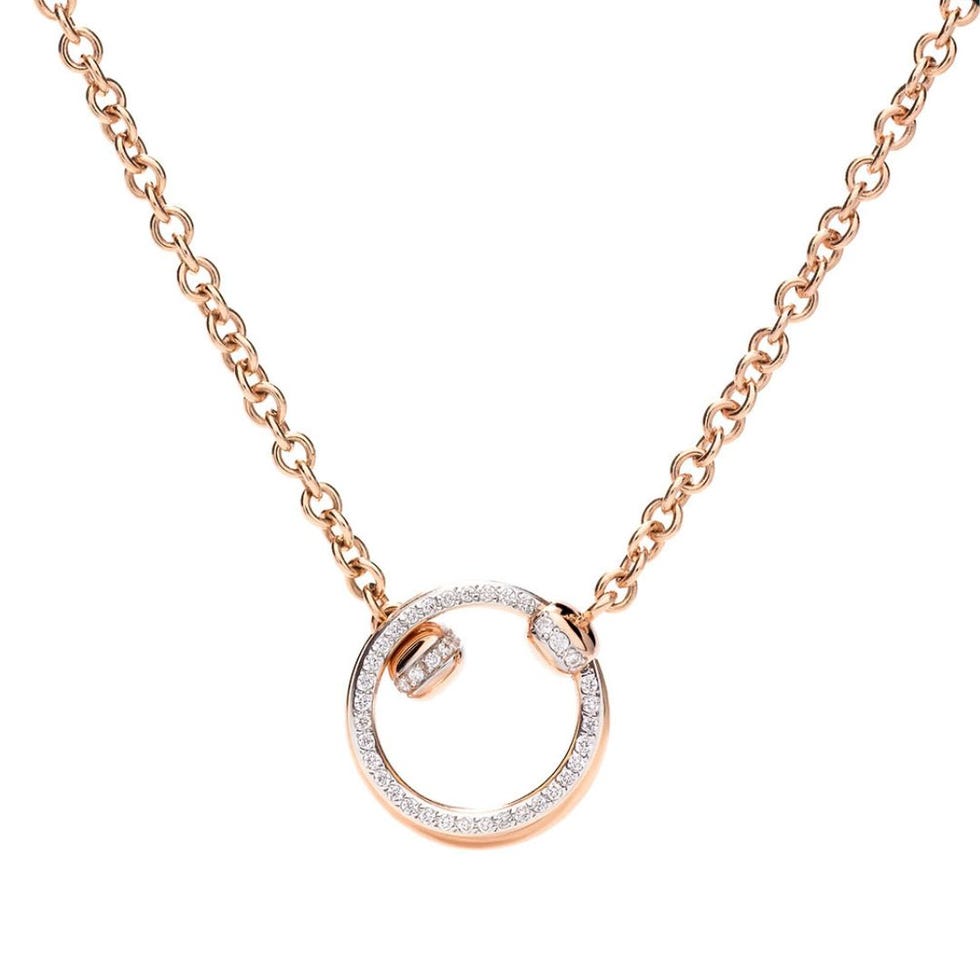 a gold chain with a diamond pendant