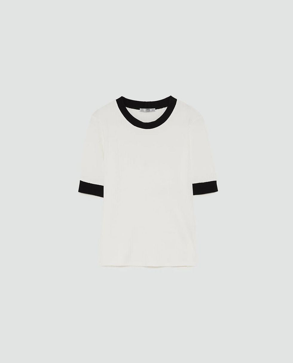 White, Clothing, T-shirt, Black, Sleeve, Neck, Top, Outerwear, Smile, Font, 