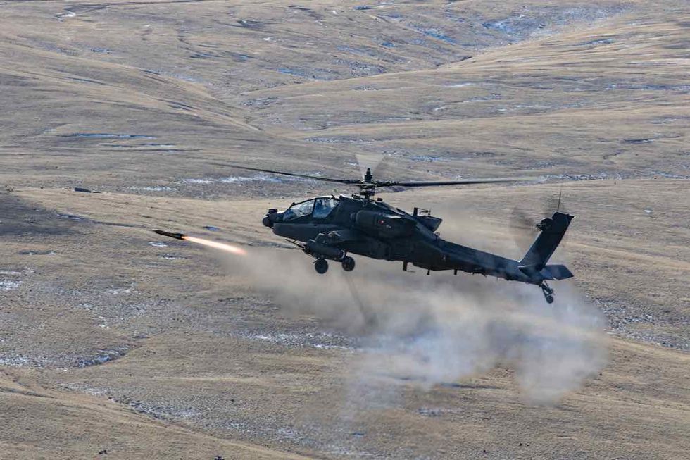 soldiers assigned to 1 229 attack battalion, 16th combat aviation brigade fire an agm 114 hellfire missile from their ah 64e apache helicopter at yakima training center, wash on jan 24, 2023us army photo by capt kyle abraham, 16th combat aviation brigade