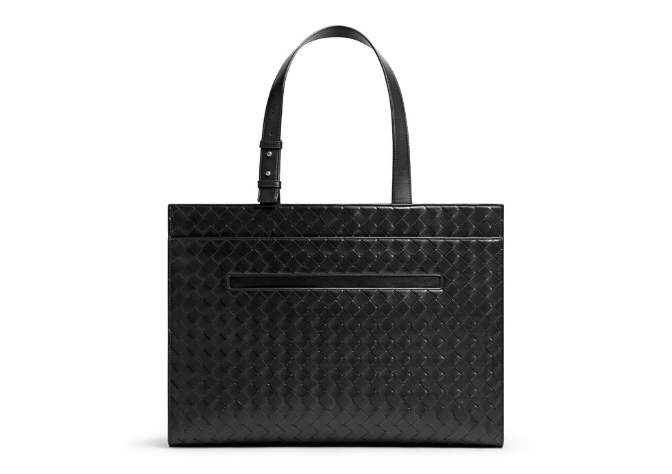 a black handbag with a handle