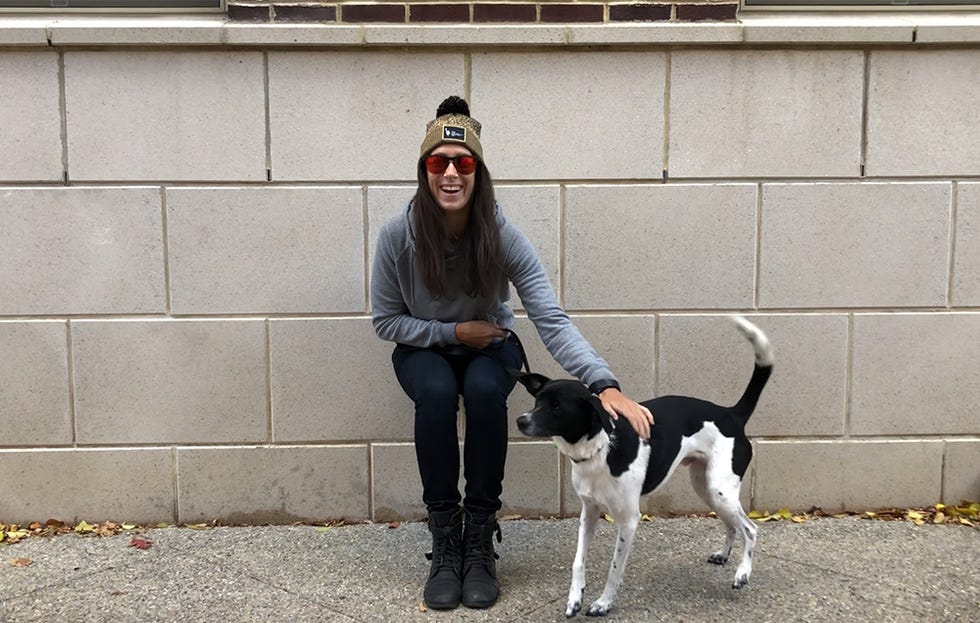 Wall sits with a dog