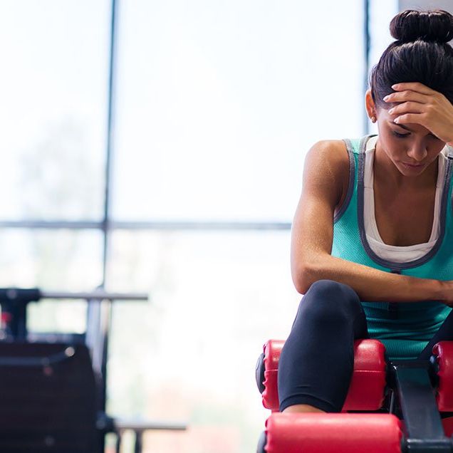 Woman bored with her workout