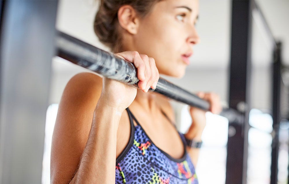 Exactly How To Use The Assisted Pullup Machine At The Gym | Women's Health