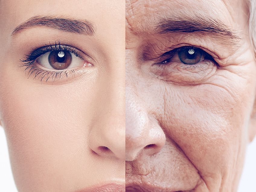An Old Lady With Deep Eyes And Wrinkles On Her Face Stock Photo