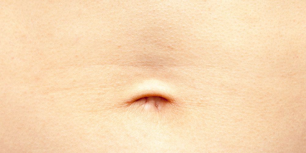 Signs your belly button piercing is healed.