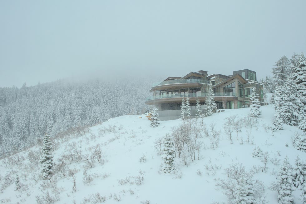 Modern house in a snowy mountain landscape