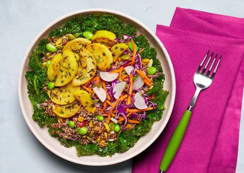 a bowl of grains, greens and zucchini with a fork and magenta napkin from green chef, a good housekeeping pick for best vegan meal delivery service