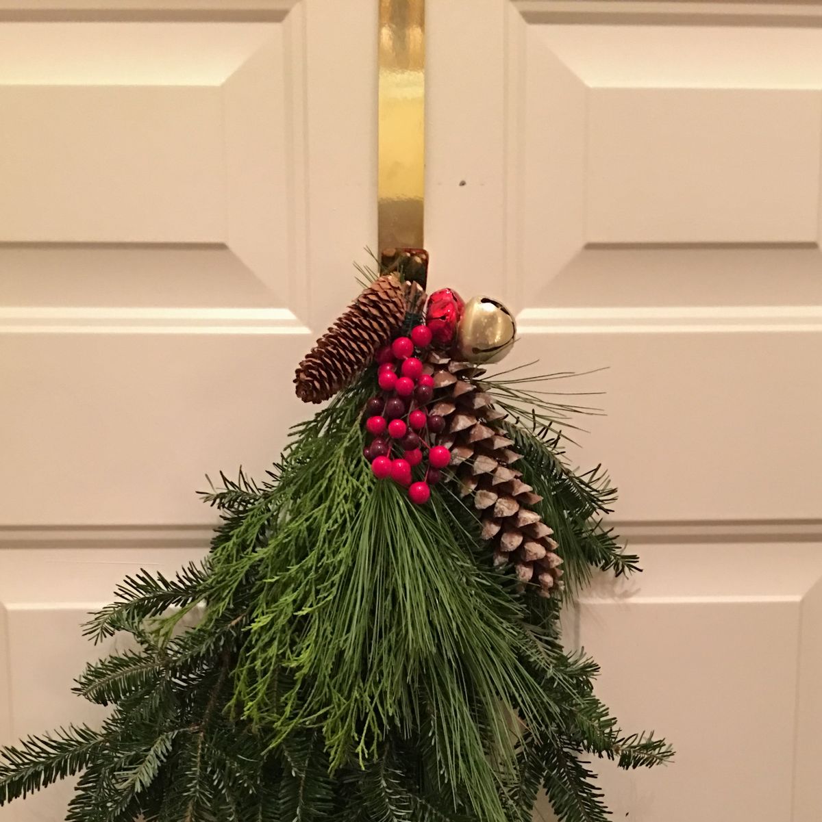 Put extra Christmas tree branches to good use with this DIY