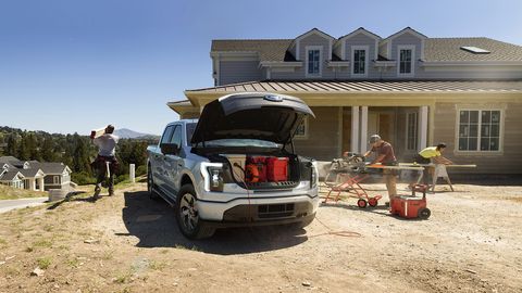 2022 ford f 150 lightning xlt pre production model with available features shown available starting spring 2022 cargo and load capacity limited by weight and weight distribution