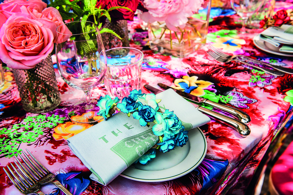 Pink, Turquoise, Textile, Party favor, Event, Flower, Table, Plant, Linens, Floral design, 