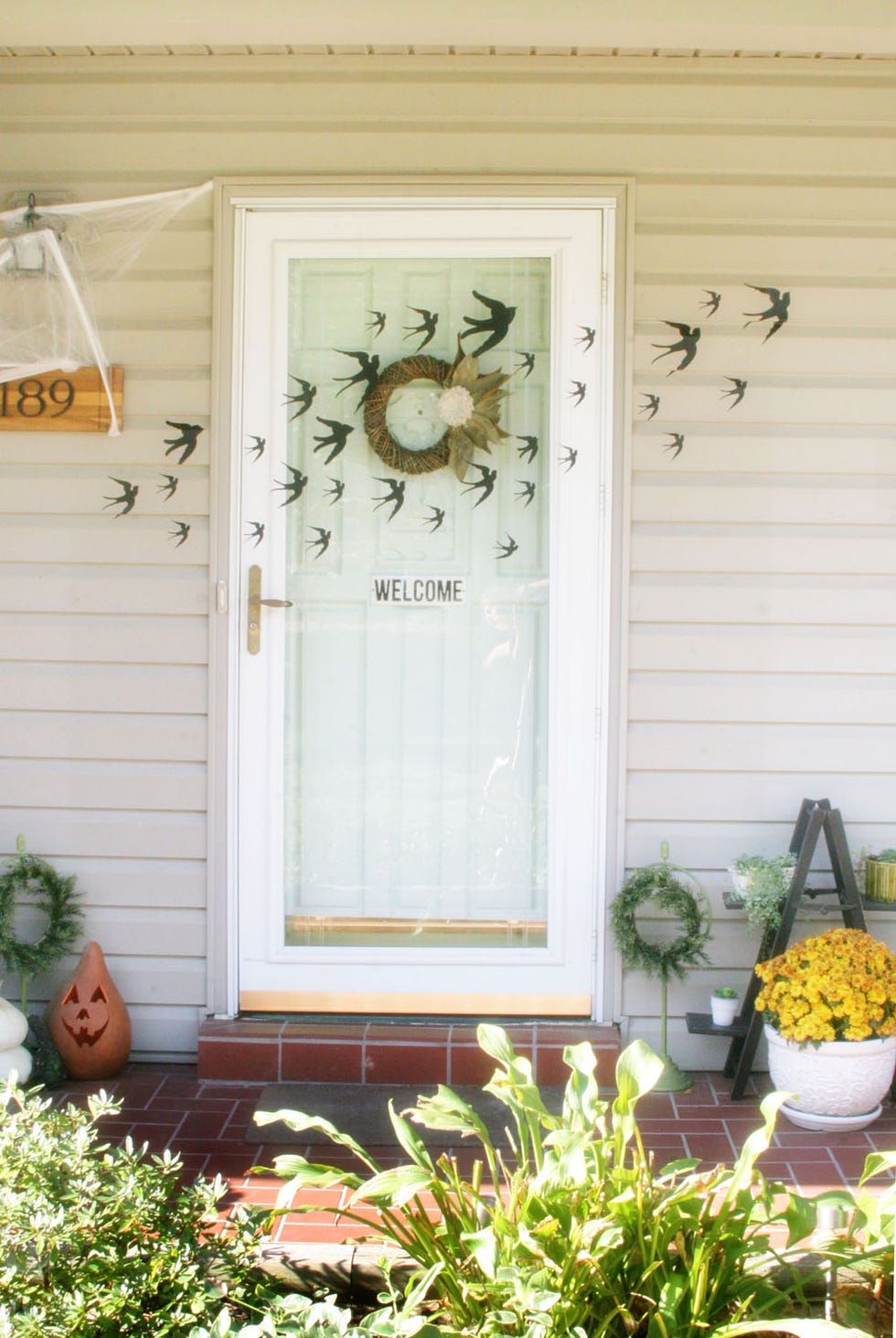 idées de décoration de porte d'Halloween oiseaux