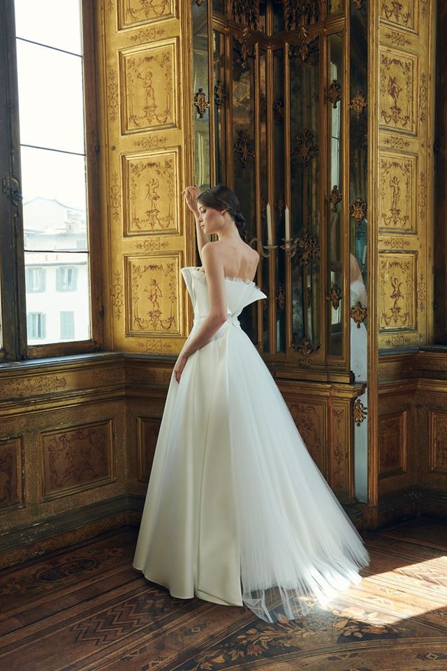 Gown, Wedding dress, Dress, Bride, Clothing, Photograph, Bridal clothing, Bridal party dress, Shoulder, Bridal accessory, 