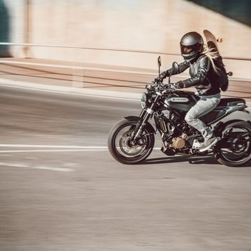 a man riding a motorcycle