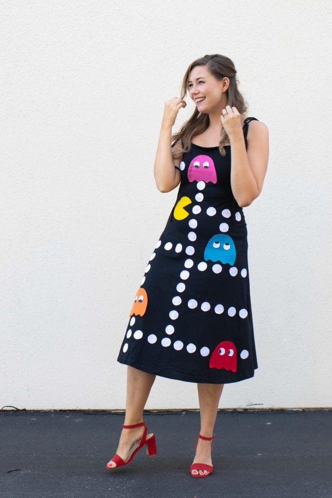 a woman wearing a pac man inspired dress designed by club crafted