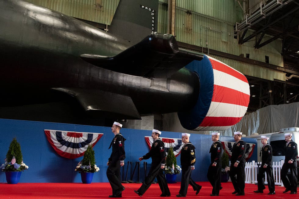 groton, conn march 16, 2024 – the crew of the pre commissioning unit pcu idaho ssn 799 march in formation during a christening ceremony at general dynamics electric boat shipyard facility in groton, conn, march 16, 2024 idaho and crew will operate under submarine squadron subron four whose primary mission is to provide attack submarines that are ready, willing, and able to meet the unique challenges of undersea combat and deployed operations in unforgiving environments across the globe us navy photo by john narewski