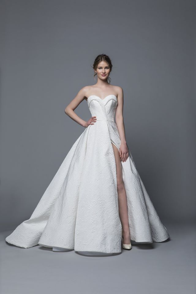 Gown, Fashion model, Clothing, Wedding dress, Dress, Bridal party dress, Shoulder, Bridal clothing, Bridal accessory, A-line, 