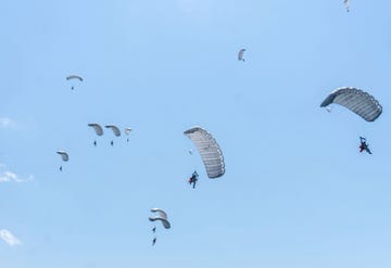 multinational special operations forces infill using powered paragliders