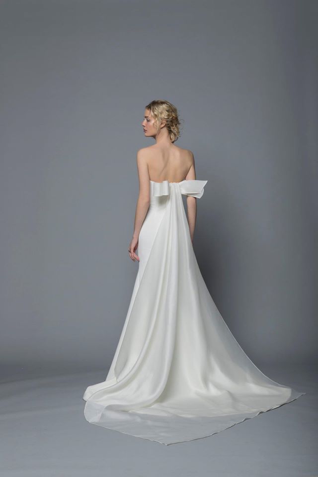 Gown, Wedding dress, Clothing, Fashion model, Dress, Bridal party dress, Shoulder, Bridal clothing, Bride, Bridal accessory, 