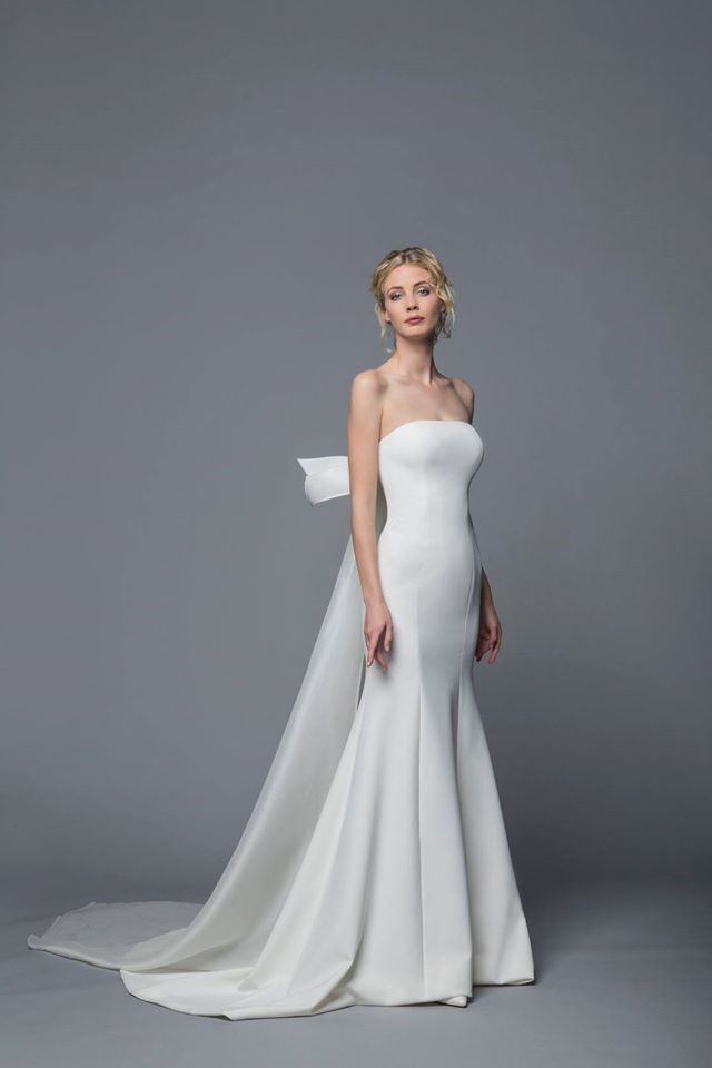 Gown, Wedding dress, Clothing, Fashion model, Dress, Bridal party dress, Bridal clothing, Shoulder, Photograph, Bridal accessory, 