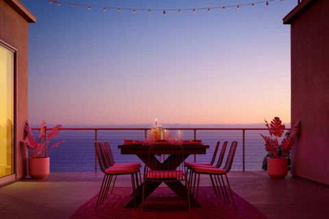 Flowerpot, Lighting, Table, Furniture, Chair, Amber, Real estate, Outdoor table, Resort, Evening, 