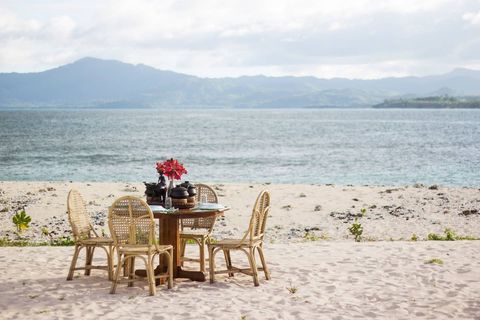 chairs and tables on private island in Philippines  