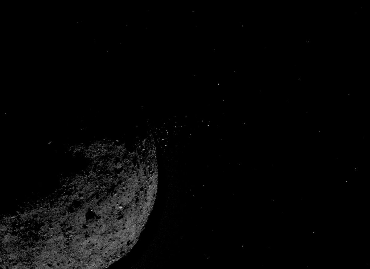 The asteroid Bennu ejects material into space.