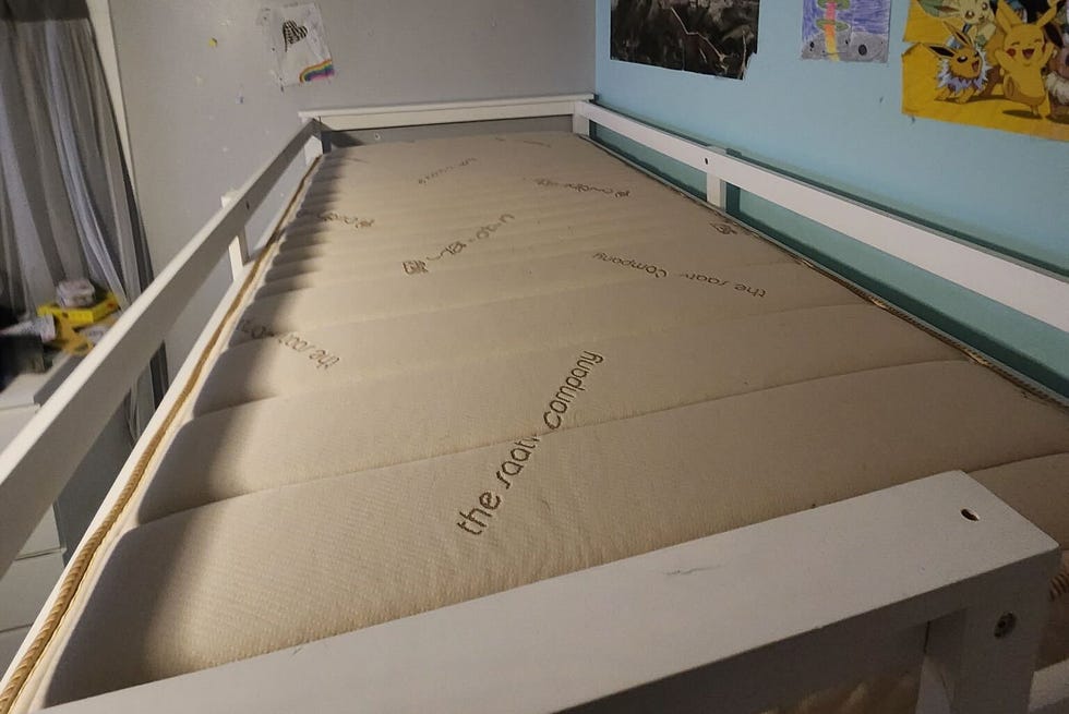 best kids mattresses - saatva a saatva mattress on a bunk bed in a tester's home
