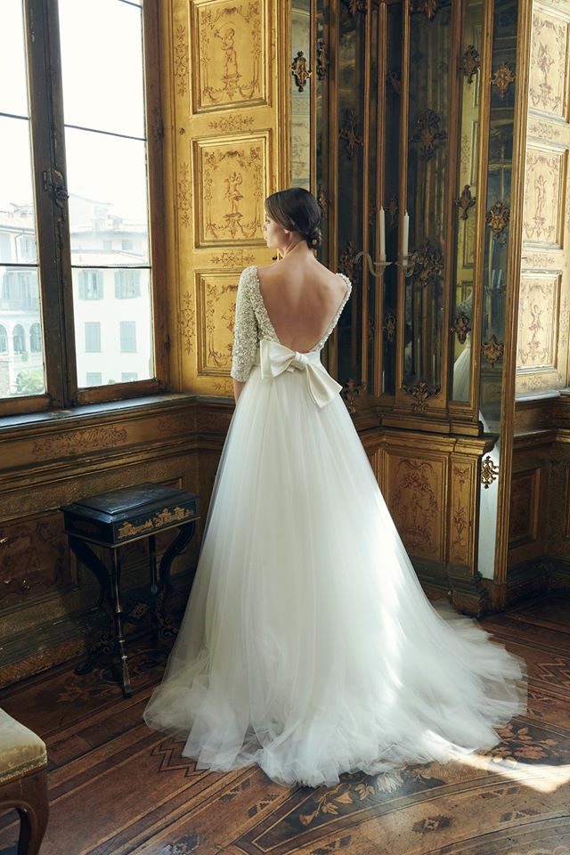 Gown, Wedding dress, Dress, Bride, Clothing, Bridal clothing, Bridal party dress, Photograph, Shoulder, Bridal accessory, 