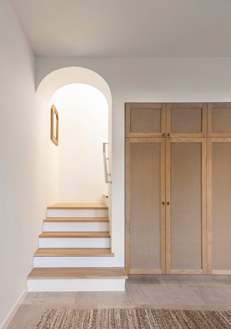 built in storage closets under stairs