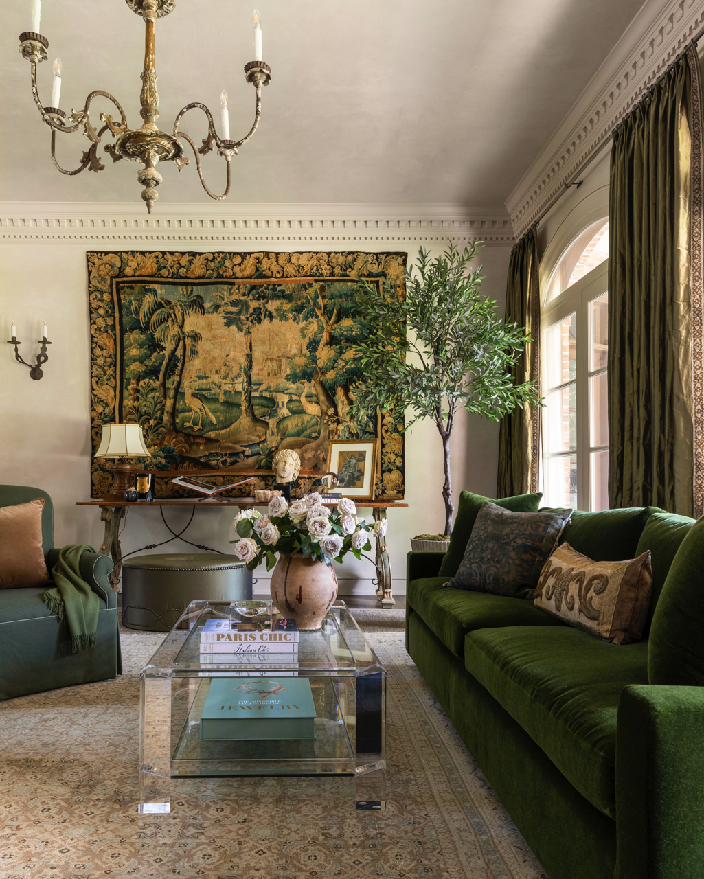 elegant living room with green sofas and decorative elements
