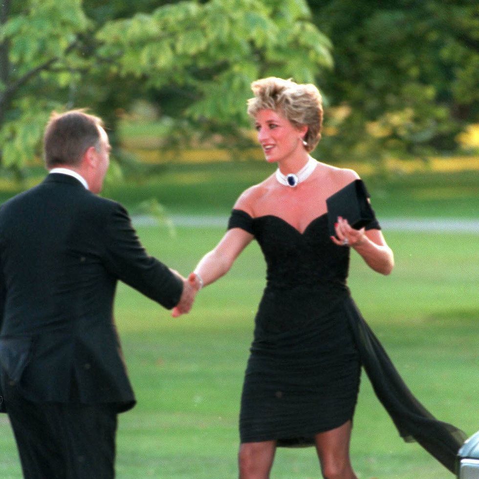 Diana, Princess of Wales, wearing a stunning black dress commissioned from Christina Stambolian, attends the Vanity Fair party