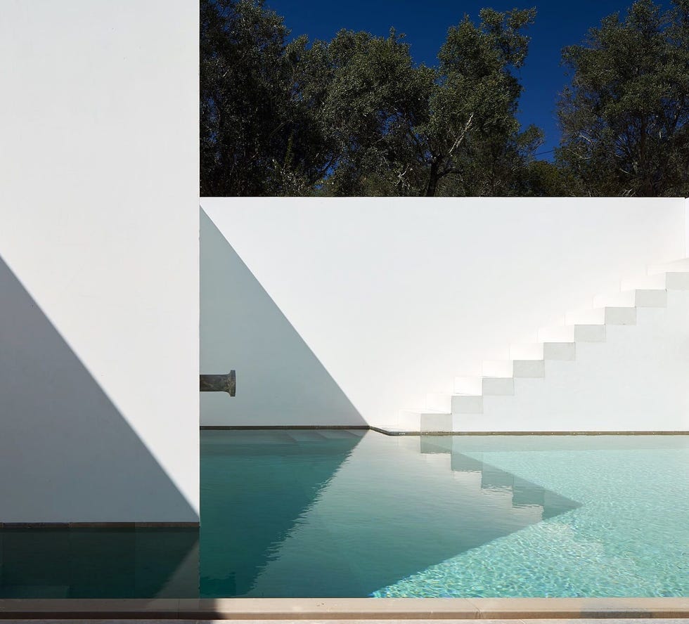 piscina exterior com escadas casa luum