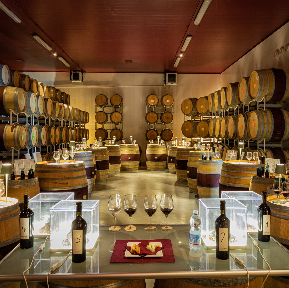 Winery, Wine cellar, Room, Interior design, Distilled beverage, Building, Barrel, 