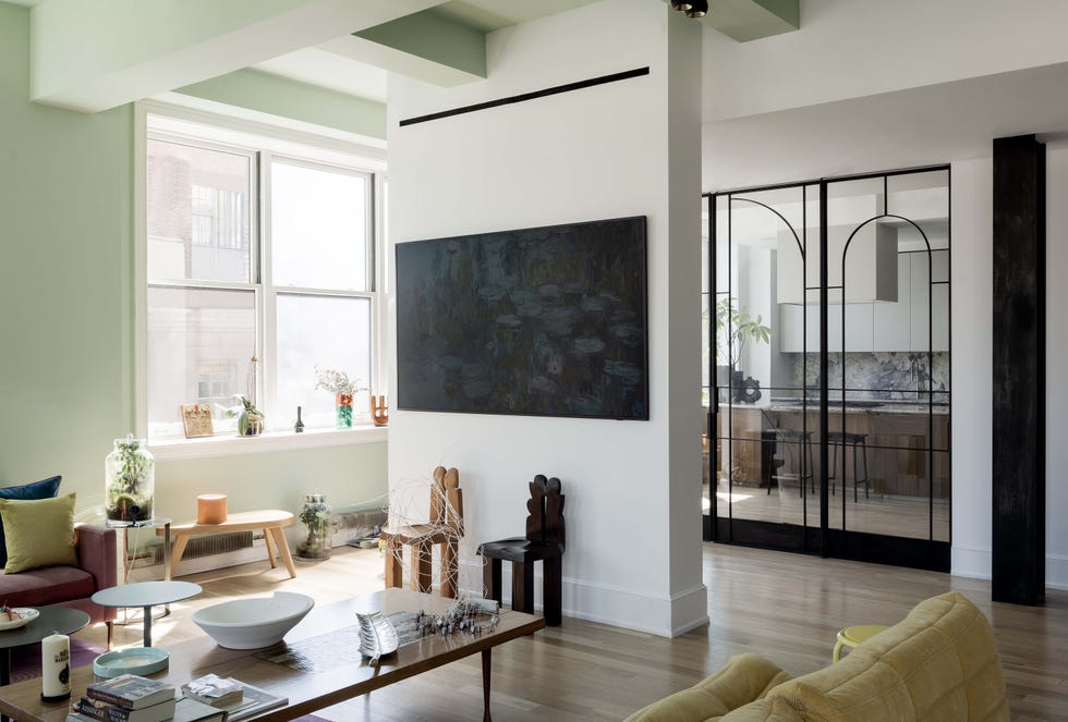 Modern living room with art and furniture.