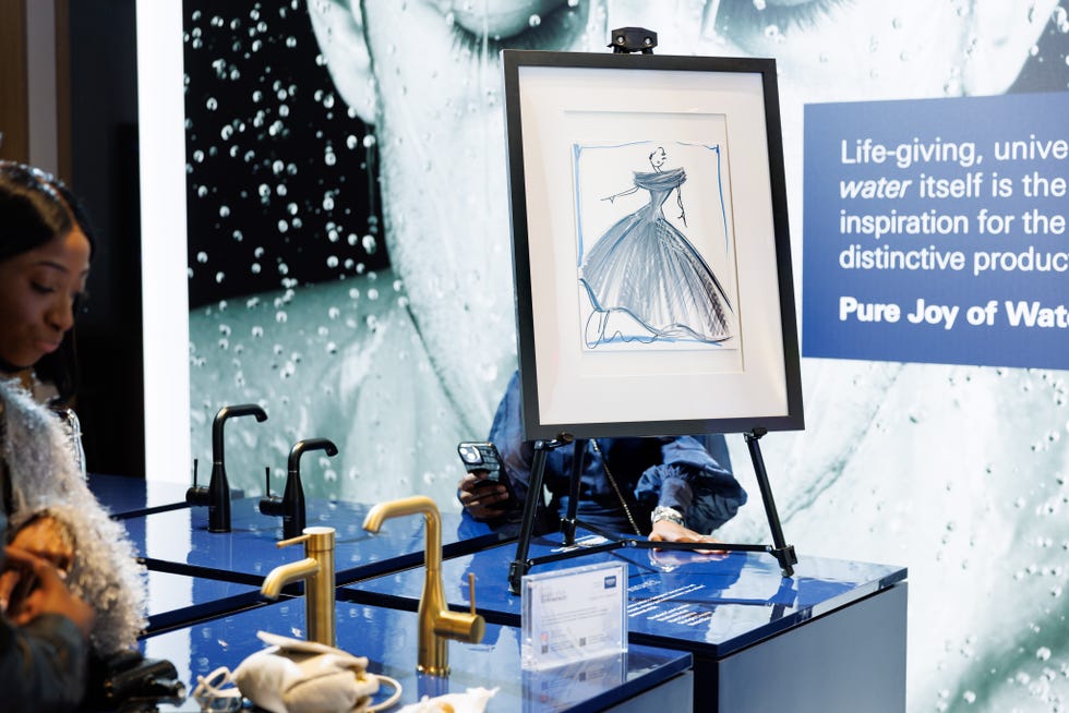 Display featuring a fashion illustration in a gallery-like setting