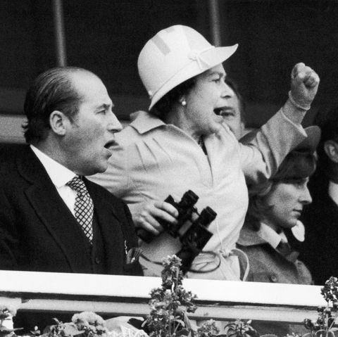 The Queen and her racing manager Lord Porchester watch the finish of the 1978 Epsom Derby .