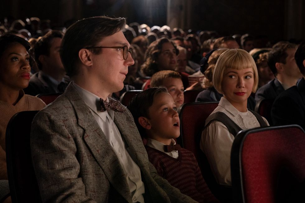 from left burt fabelman paul dano, younger sammy fabelman mateo zoryan francis deford and mitzi fabelman michelle williams in the fabelmans, co written and directed by steven spielberg