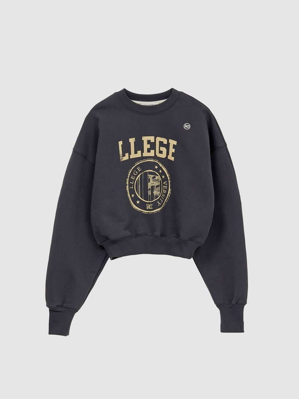 a black sweater with a gold logo