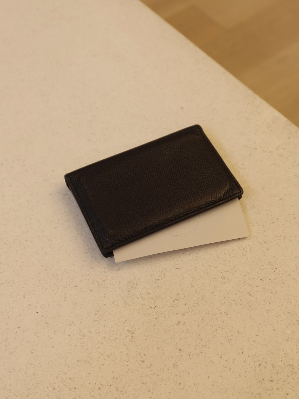 a black square object on a white surface