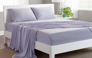 Bed, Bed sheet, Furniture, Bedding, Mattress, Bed frame, Bedroom, Purple, Textile, Duvet cover, 