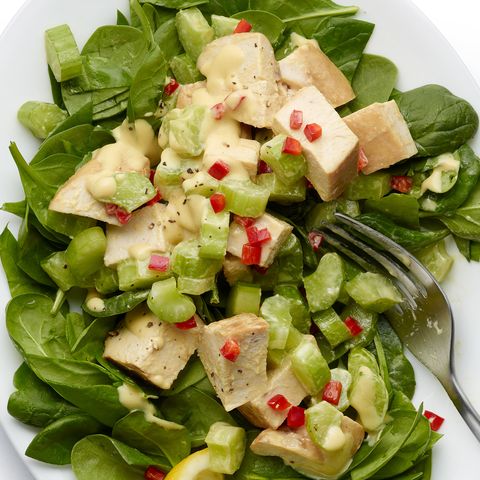 Spicy chicken salad on baby spinach