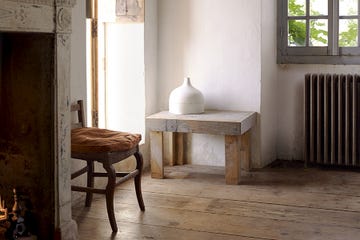 Creative French farmhouse belonging to designer of antique textiles, murals and mirrors, Mathilde Labrouche