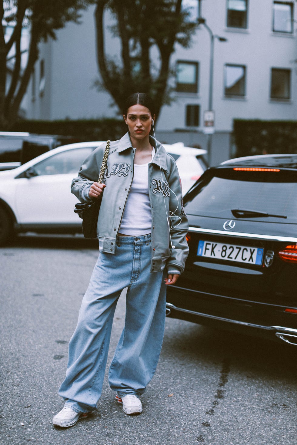 Woman with Louis Vuitton bag and Chanel scarf before Fendi fashion show,  Milan Fashion Week street style – Stock Editorial Photo © AndreaA.  #326233302