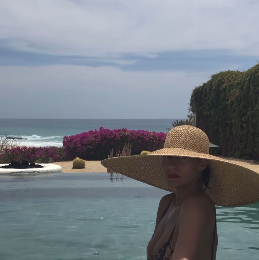 Tracee Ellis Ross Sunbathing in a Bikini and Massive Straw Hat Is the Best Thing You'll See Today