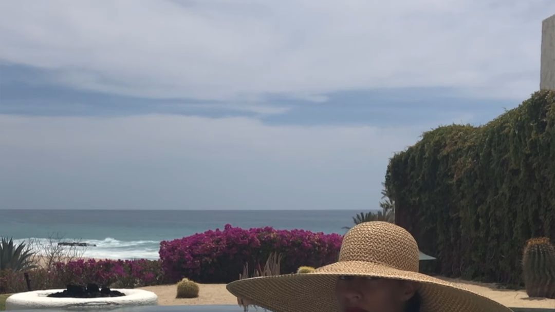 Tracee Ellis Ross Sunbathing in a Massive Straw Hat Is an Entire Mood