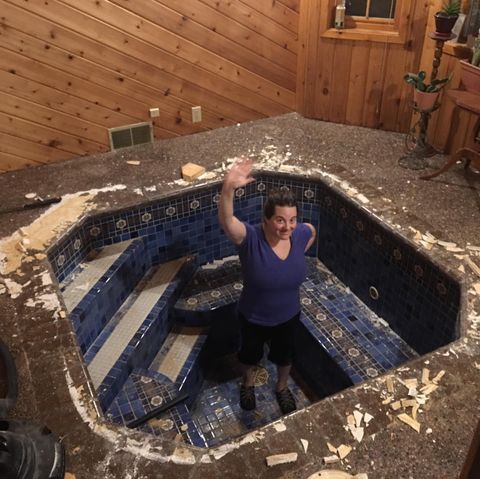 Jenny Ronsman in hot tub being refurbished