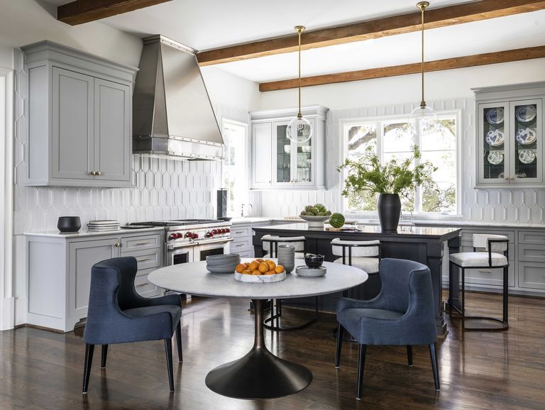 breakfast nook, kitchen, white cabinets, blue chairs