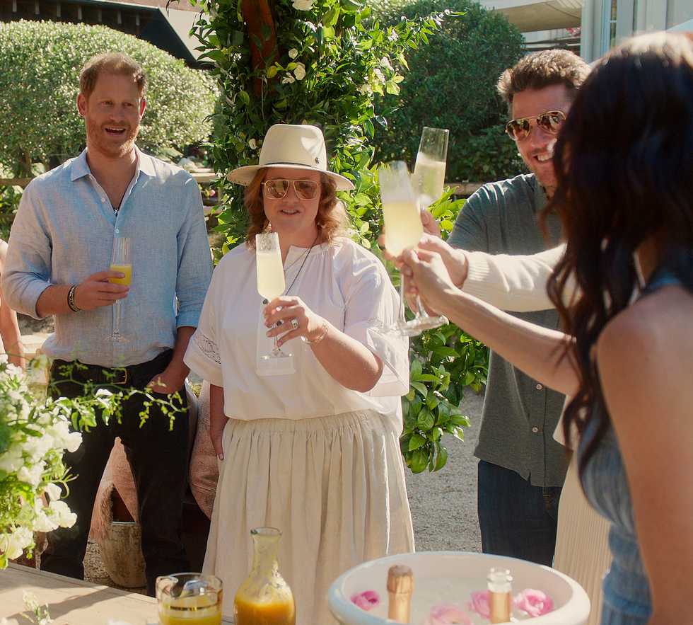 Group celebrating with drinks at a gathering