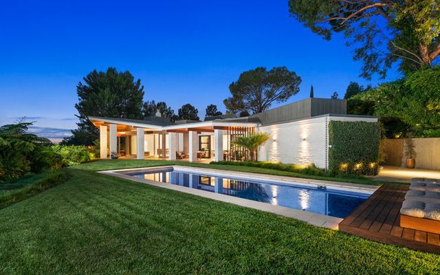 ellen degeneres's former home in beverly hills, now owned by sue gross, is on the market for $38 million